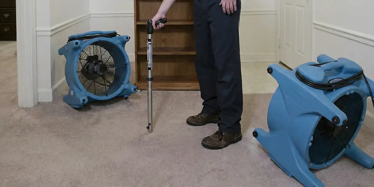emergency water removal equipment deployed to dry a flooded residential interior in Fort Collins, CO